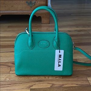 Never used before, M. I. L. A. bag